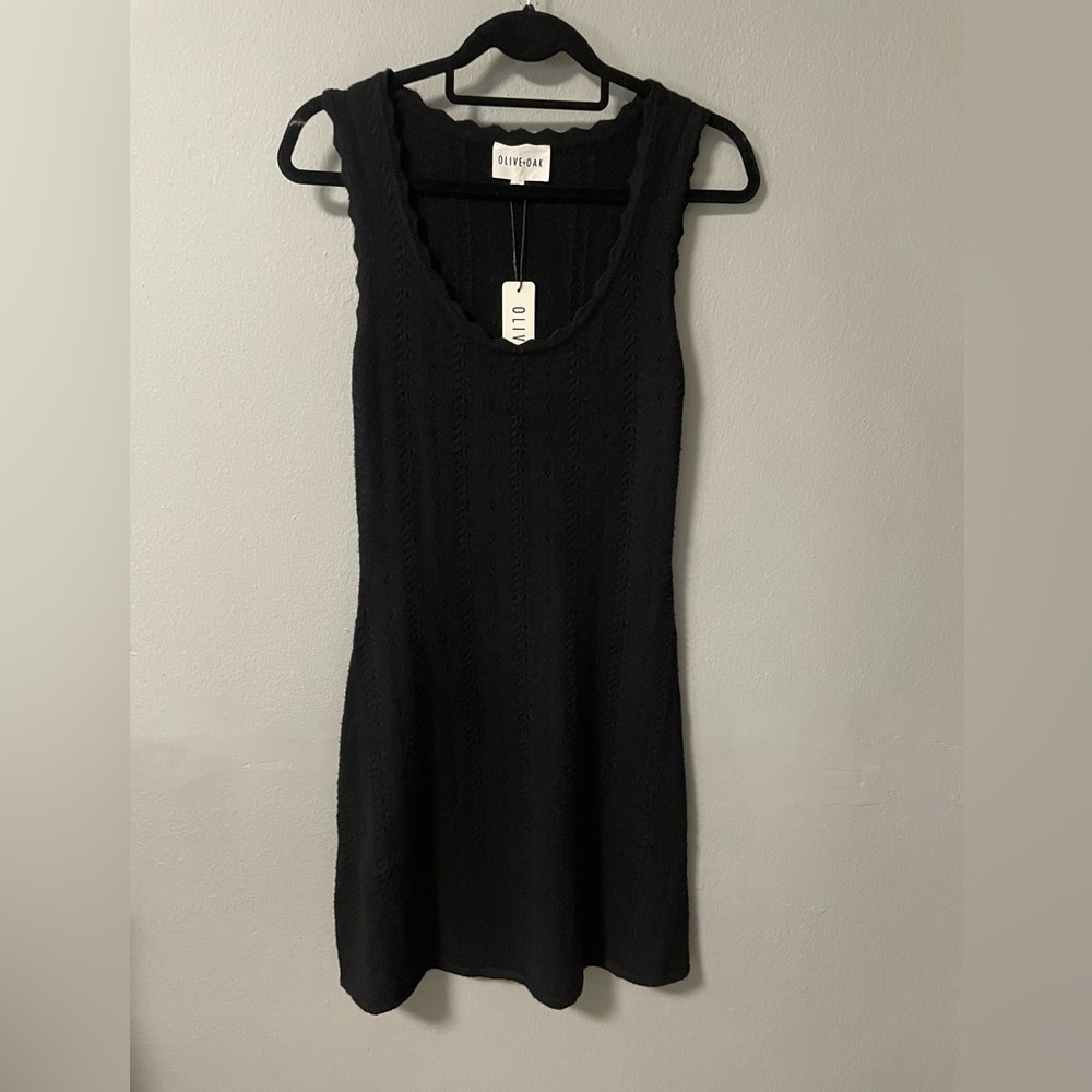 NWT Olive & Oak sleeveless black knit mini dress. Size Large